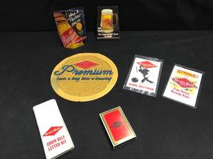 lot 112 image: Grain Belt Beer rubber bar mat, playing cards and misc items