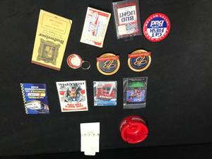 lot 113 image: Budweiser and Bud Light playing cards, 1941 notepad, golf tees, ashtray and more