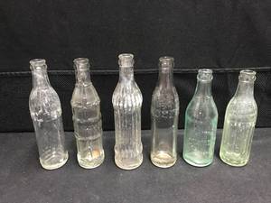 lot 115 image: Lot of 6 glass soda  pop bottles including Coca-Cola