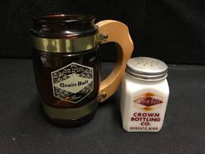 lot 120 image: Grain Belt early milk glass salt shaker and brown glass mug
