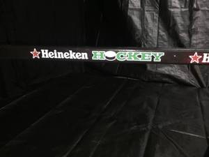 lot 123 image: Heineken Beer hockey stick - made in Canada