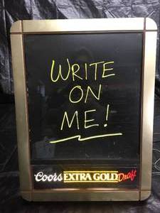 lot 207 image: Coors Extra Gold write on board