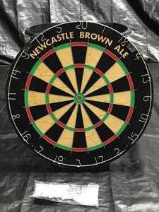 lot 209 image: Newcastle Brown Ale dart board, Official Tournament Specs, NOS New Old Stock