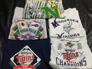 lot 210 image: Lot of MN sports history shirts Superbowl XXVI, World Series 1987, Twins, MN North Stars 1991, and Vikings