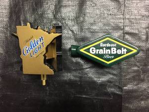 lot 214 image: Lot of 2 tap handles Mich Golden and Grain Belt Nordeast