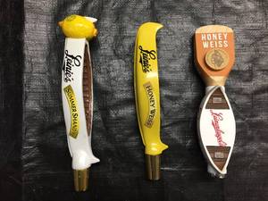 lot 215 image: Lot of 3 Leinenkugels  Leinies tap handles