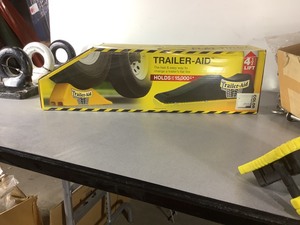 lot 1121 image: Trailer Aid Flat Tire Lift