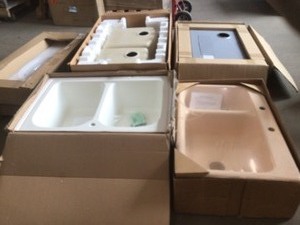 Pallets with assorted sinks customers returns mostly are open boxes