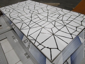 WHITE CERAMIC TILE WITH GOLD ACCENTS