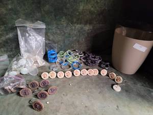 Garbage Can Full of Shower Curtain Rings