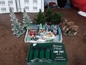 lot 97 image: Collection Lamp Posts, Glass Trees & Figurines.  Extra Light Cords & Bulbs
