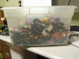 lot 13 image: 180pcs. Hot wheels cars and trailer...