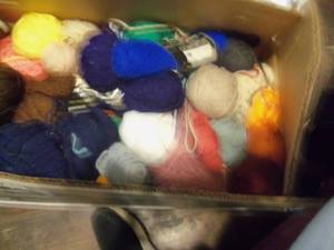 lot 32 image: Box full of yarn assorted colors...