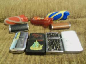 lot 90 image: Lighters and lighter cases...