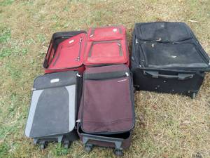 lot 143 image: 5pcs. Rolling luggage with handles...