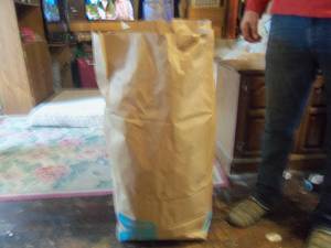 lot 232 image: Tall Paper bag with 12 sheets, bla...