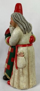 lot 43 image: Leo Smith Folk Art Santa & Mrs. Claus Figurine from Dept. 56 Our Town Collection