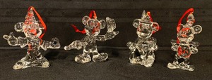 lot 58 image: Disney Collectible Arribas Bros. Mickey Through The Years - Set of 4 Crystal Ornaments of Mickey Mouse