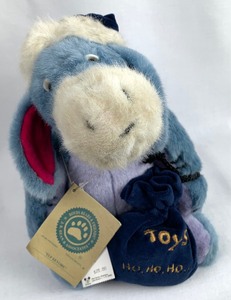 lot 75 image: Disney Collectible Elf Eeyore (Stuffed Toy) and ornament from 1999 A Christmas to Remember, The Boyds Collection