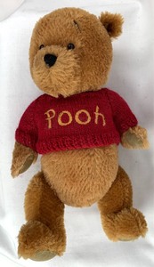 lot 78 image: Disney Collectible Classic Pooh Mohair (Stuffed toy) and ornament from 1999 A Christmas to Remember, The Boyds Collection, Numbered Lim. Ed. #320600