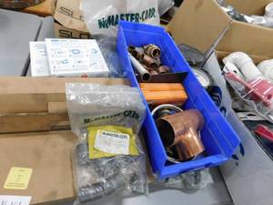 lot 101 image: Misc. Table Top Plumbing Supplies