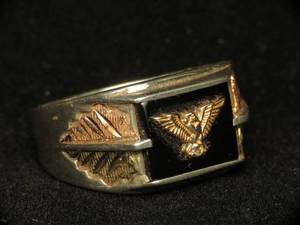 lot 10 image: Sterling Silver and Gold Mens Black Onyx Ring