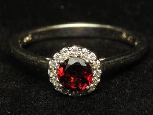 lot 25 image: Sterling Silver Garnet Ladies Ring