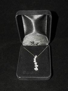 lot 26 image: Sterling Silver Princess Cut Journey Necklace