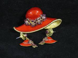 lot 52 image: Red Hat Pin and Earring Set