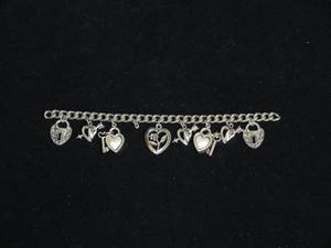 lot 73 image: Heart Theme Charm Bracelet
