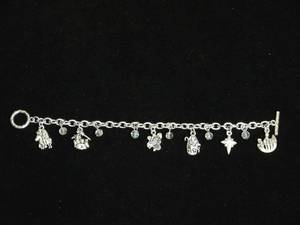 lot 75 image: Christmas Nativity Theme Charm Bracelet