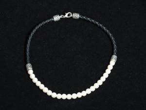 lot 88 image: Leather and Pearl Necklace