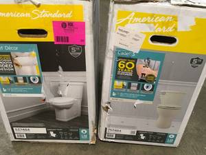 Pallet with 2 American STD Toilets not used see pictures