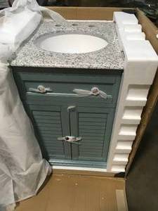 Home Decorators Hamilton Shutter 25 in. W x 22 in. D Bath Vanity in Sea Glass with Granite Vanity Top in Grey not used see pictures