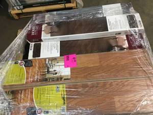 Pallet with a mix of wood flooring not used see pictures