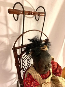 lot 207 image: Collectable Doll by Panzy & Decorative Wicker Stroller