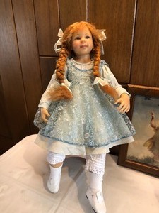 lot 58 image: Four Dolls
