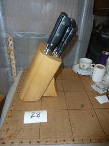 Full butcher block of knives ...