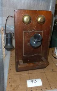 old telephone with graffiti on the ...