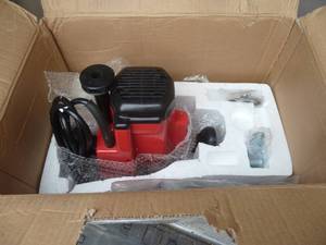 Plunge router, one of the plastic h...