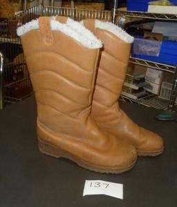 pair of leather knee high boots lin...