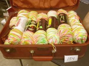 13 new skeins of yarn in suitcase...