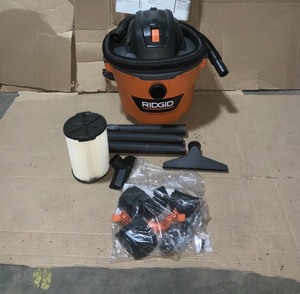 Ridgid 9 Gal. 4.25-peak HP NXT wetdry shop vacuum with filter, hoses and accessories See pics