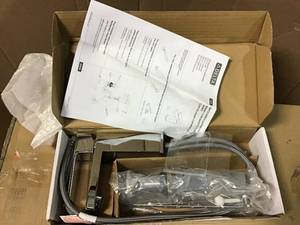 lot 9 image: Modern Single Hole Single-Handle Bathroom Faucet in Chrome by Delta in good condition