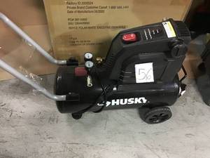 lot 56 image: 8 Gal. Portable Oil Free Electric Air Compressor by Husky in good condition