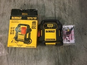lot 103 image: Dewalt 1400 Peak Amp Jump Starter with Digital Compressor