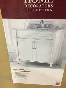 lot 201 image: Aberdeen 36 in. W x 22 in. D Single Bath Vanity in White with Carrara Marble Top with White Sink by Home Decorators Collection not used