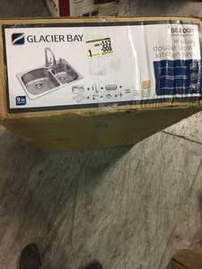 lot 209 image: All-in-One All-in-One Dual Mount Stainless Steel 33 in. 2-Hole Double Bowl Kitchen Sink by Glacier Bay not used