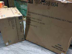 lot 214 image: Riverbrook Espresso Brown 5-Piece Outdoor Patio Aluminum Round Glass Top Dining Set with Padded Sling Swivel Chairs by Hampton Bay