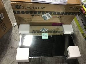 16 in. W x 26 in. H Frameless Recessed or Surface-Mount Bathroom Medicine Cabinet by Glacier Bay&nbsp&nbspin good condition&nbsp